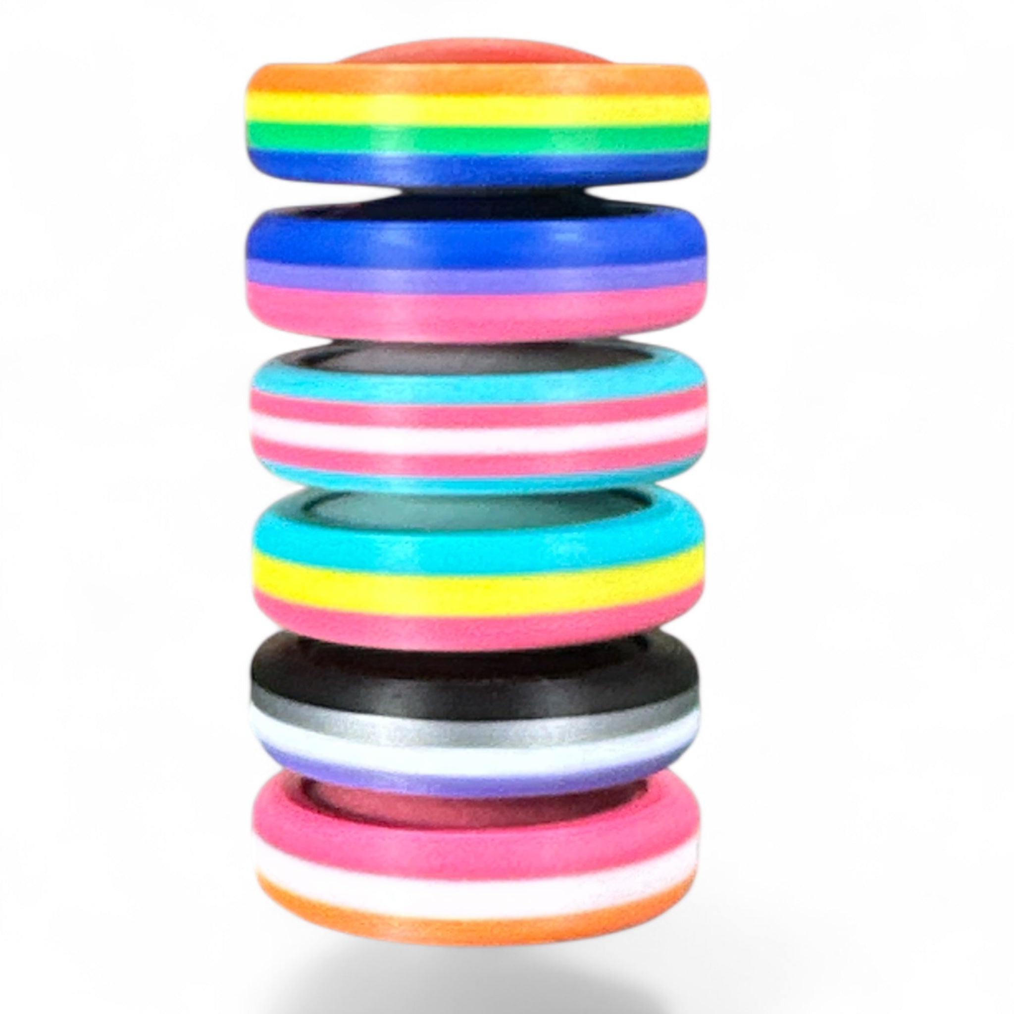 Stack of colorful rubber bands on a white background