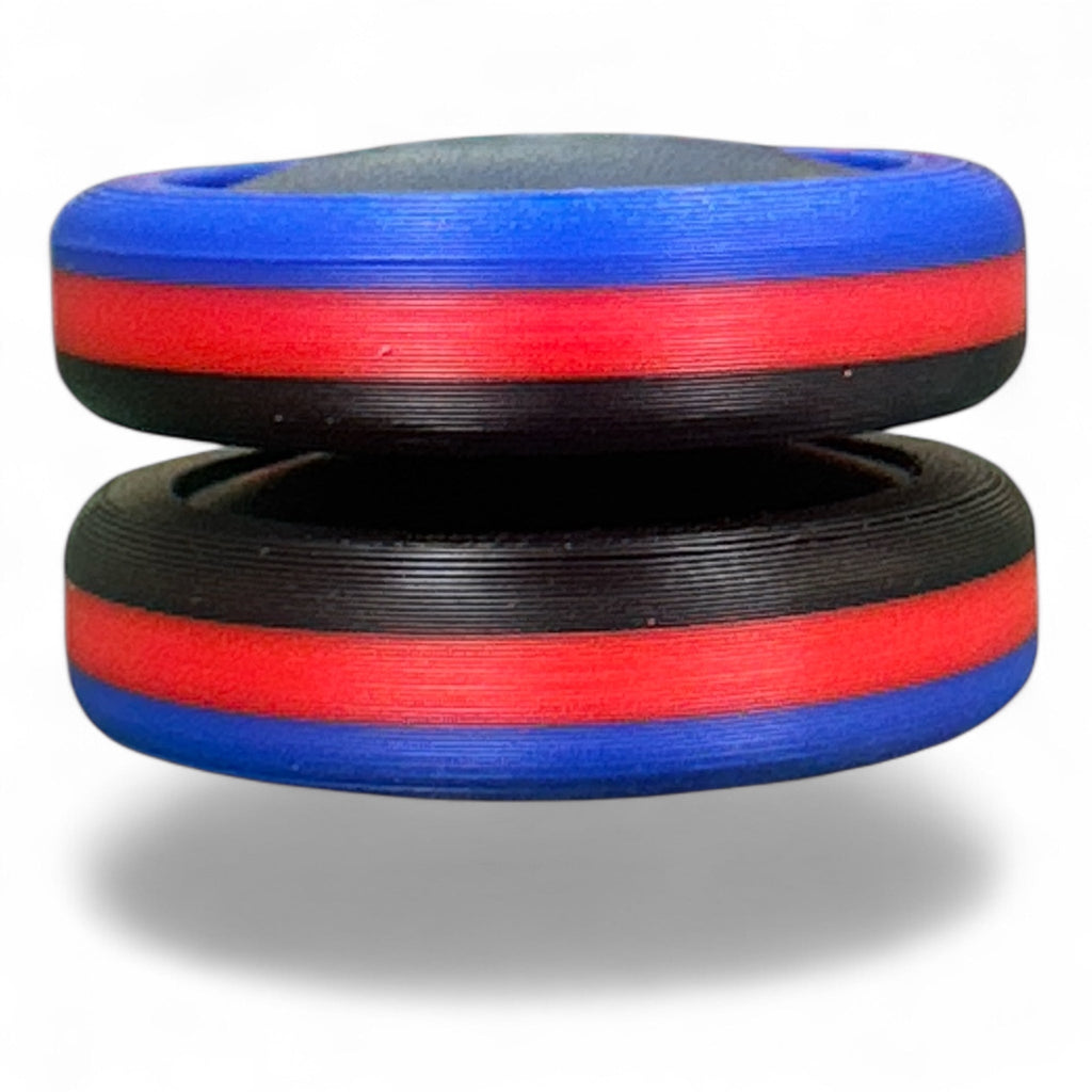Two stacked disc with red, blue, and black bands on a white background