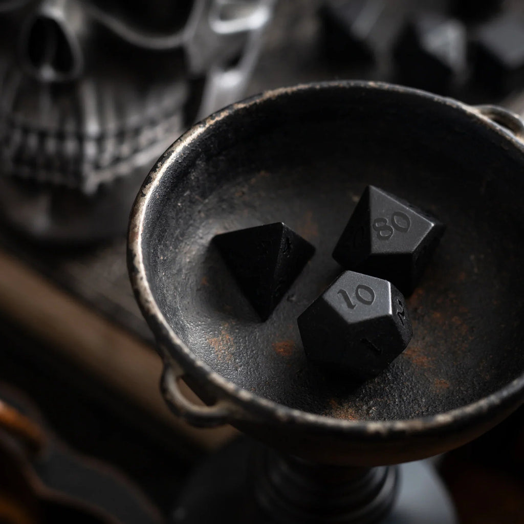 black obsidian dice with raised numbers