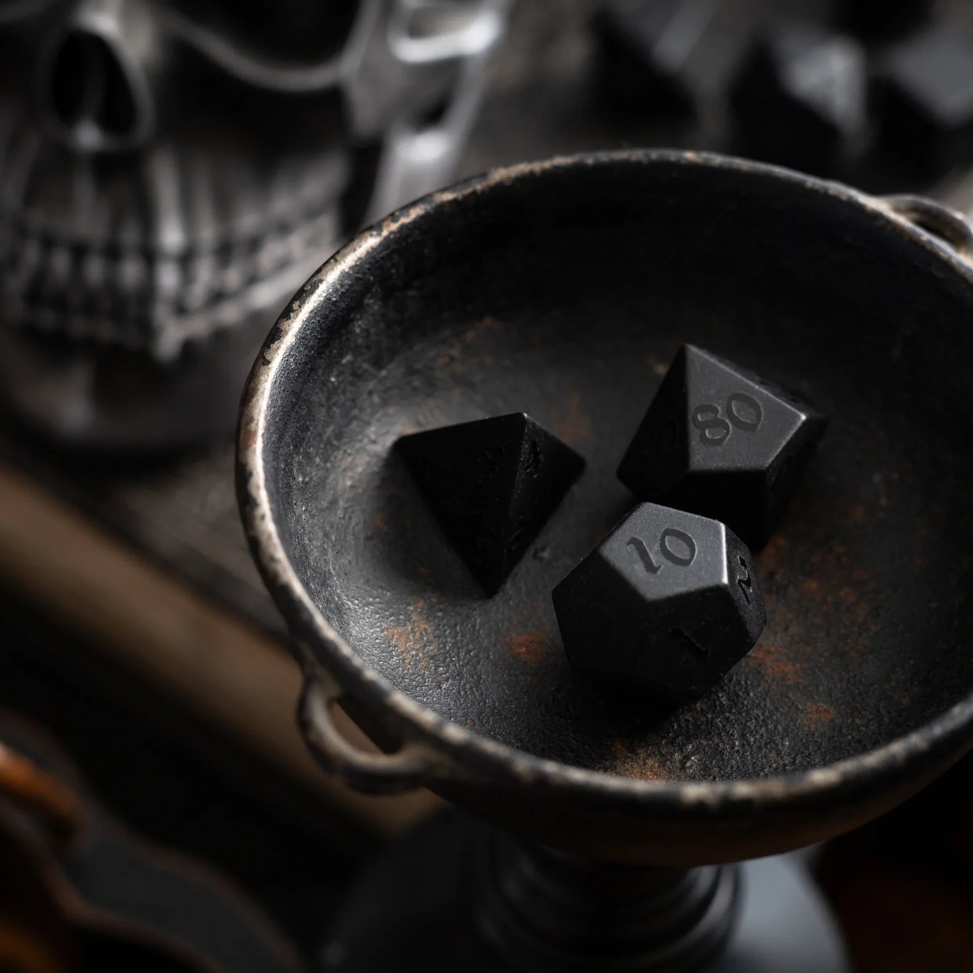 black obsidian dice with raised numbers