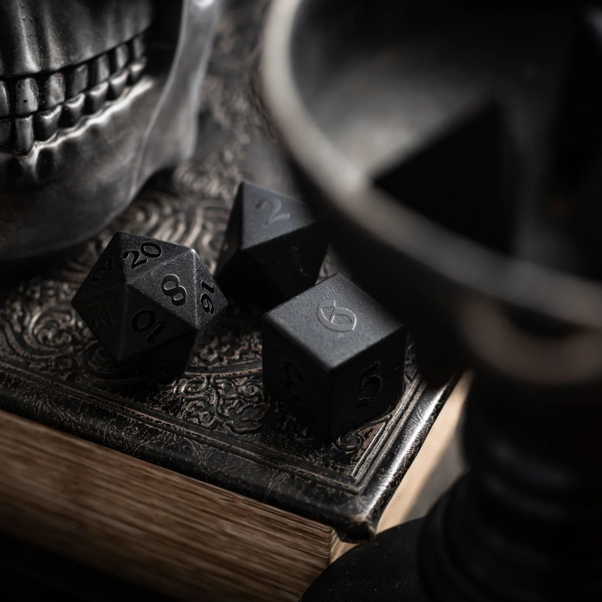 black obsidian dice with raised numbers