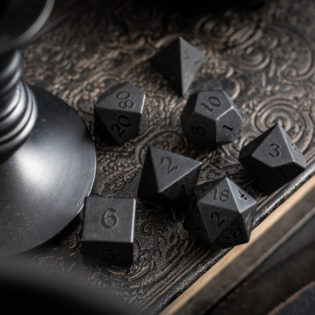 black obsidian dice with raised numbers
