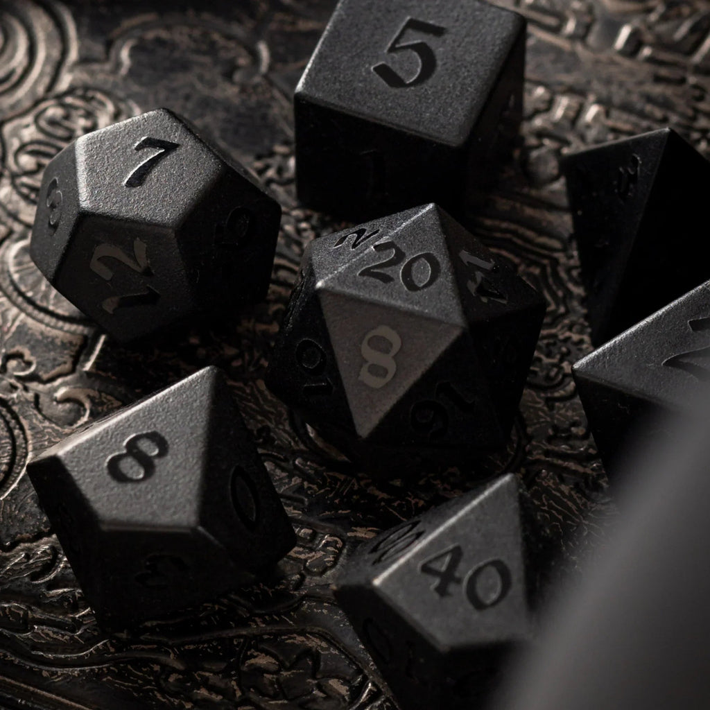 black obsidian dice with raised numbers