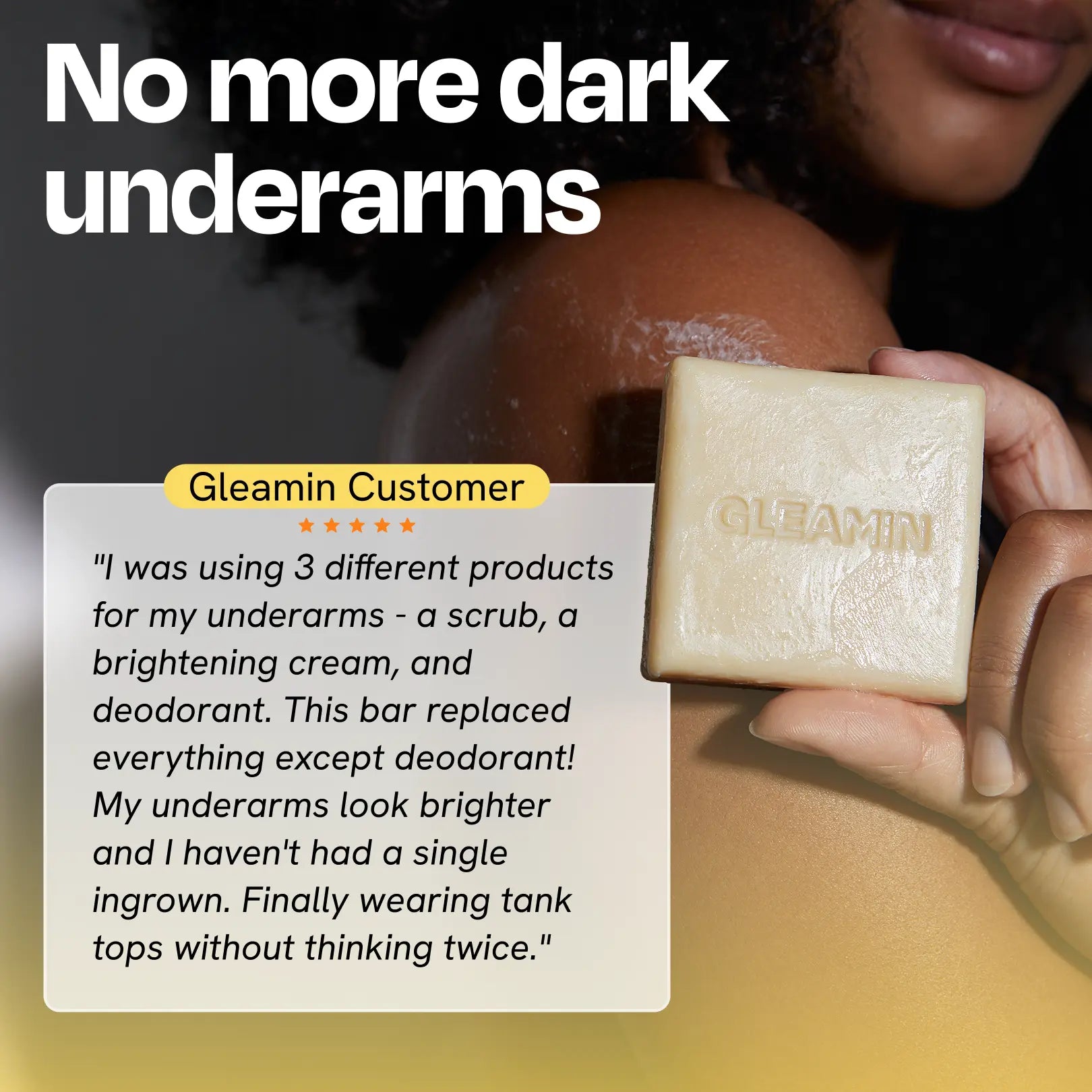 Person holding a bar of Gleamin soap with a testimonial about its effectiveness on dark underarms.