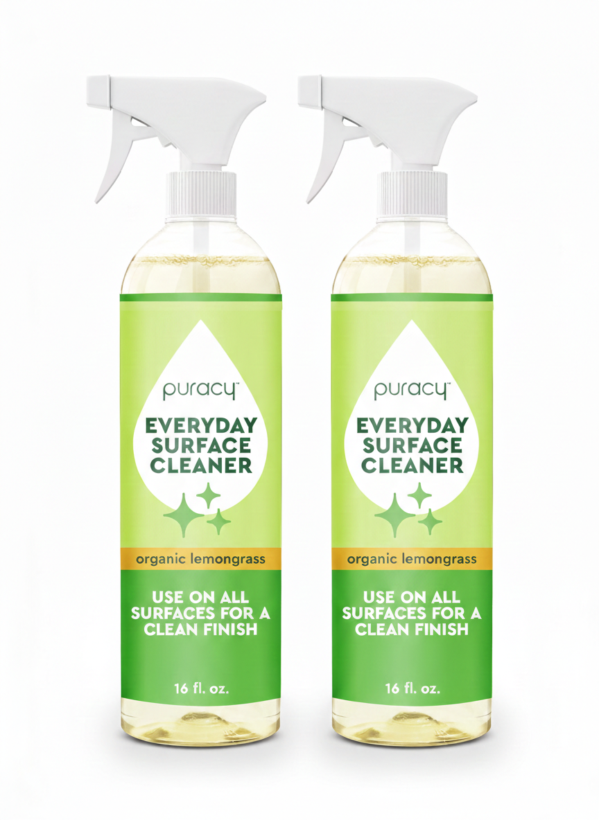 Two bottles of Puracy Everyday Surface Cleaner on a white background