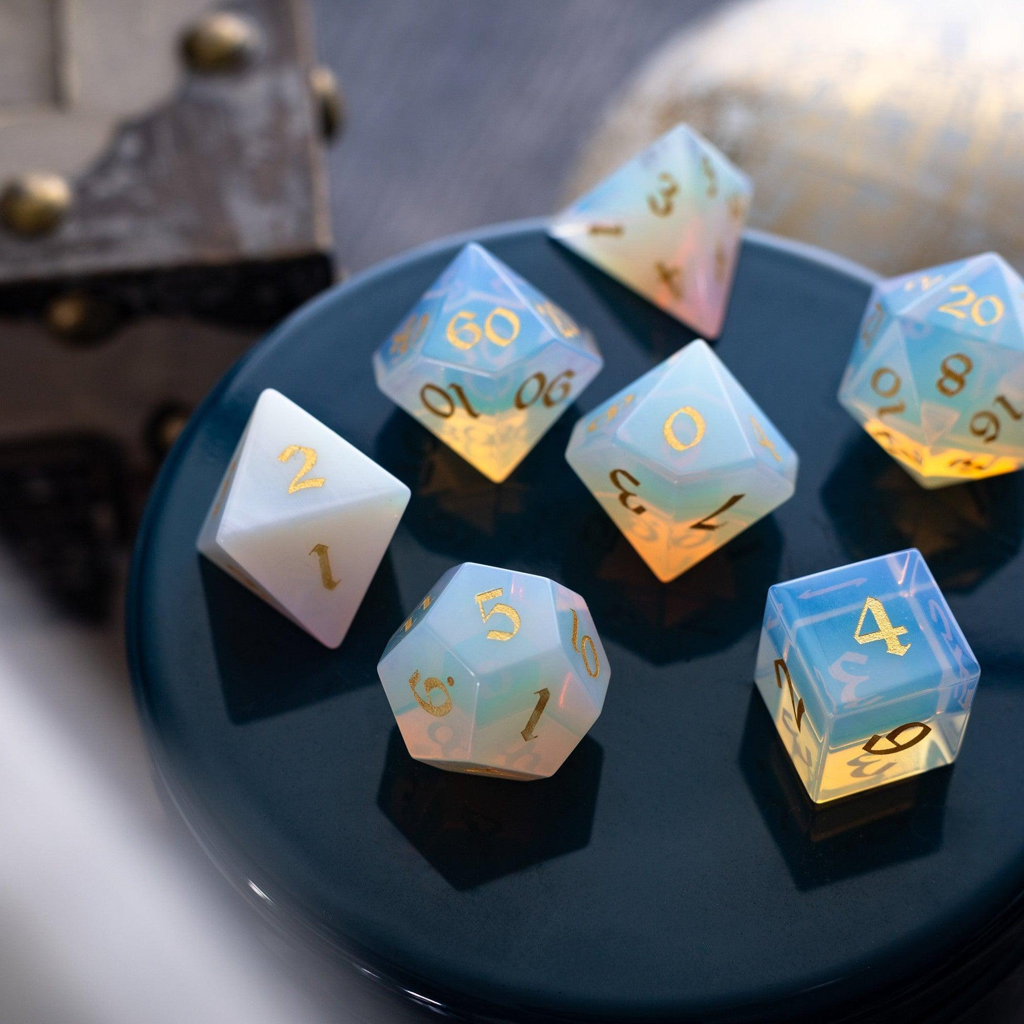 Set of colorful polyhedral dice on a dark surface