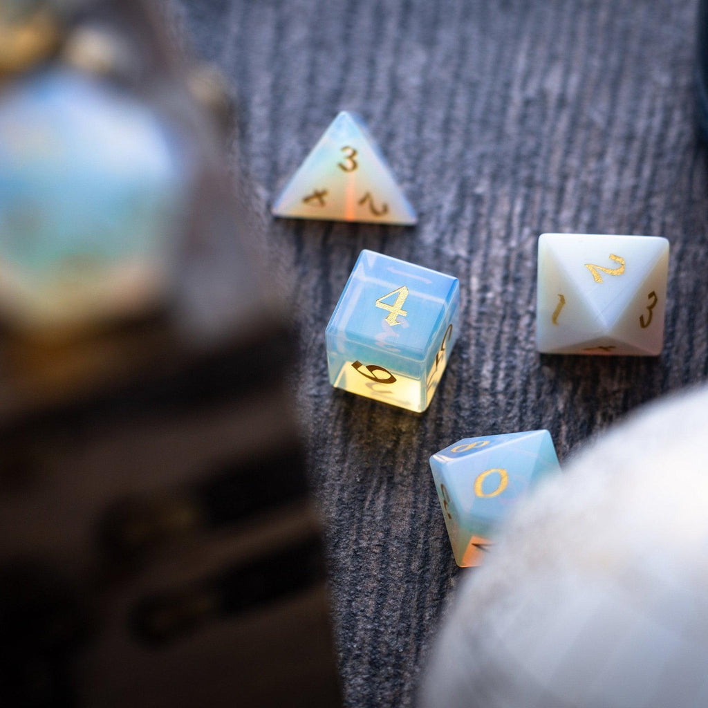 Set of polyhedral dice with numbers on a textured surface