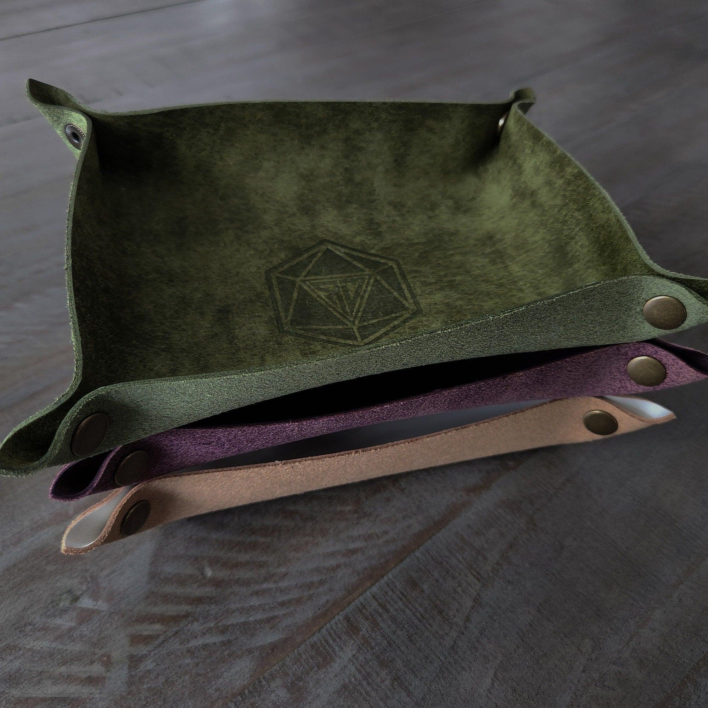 green and purple and tan leather dice roll box stacked