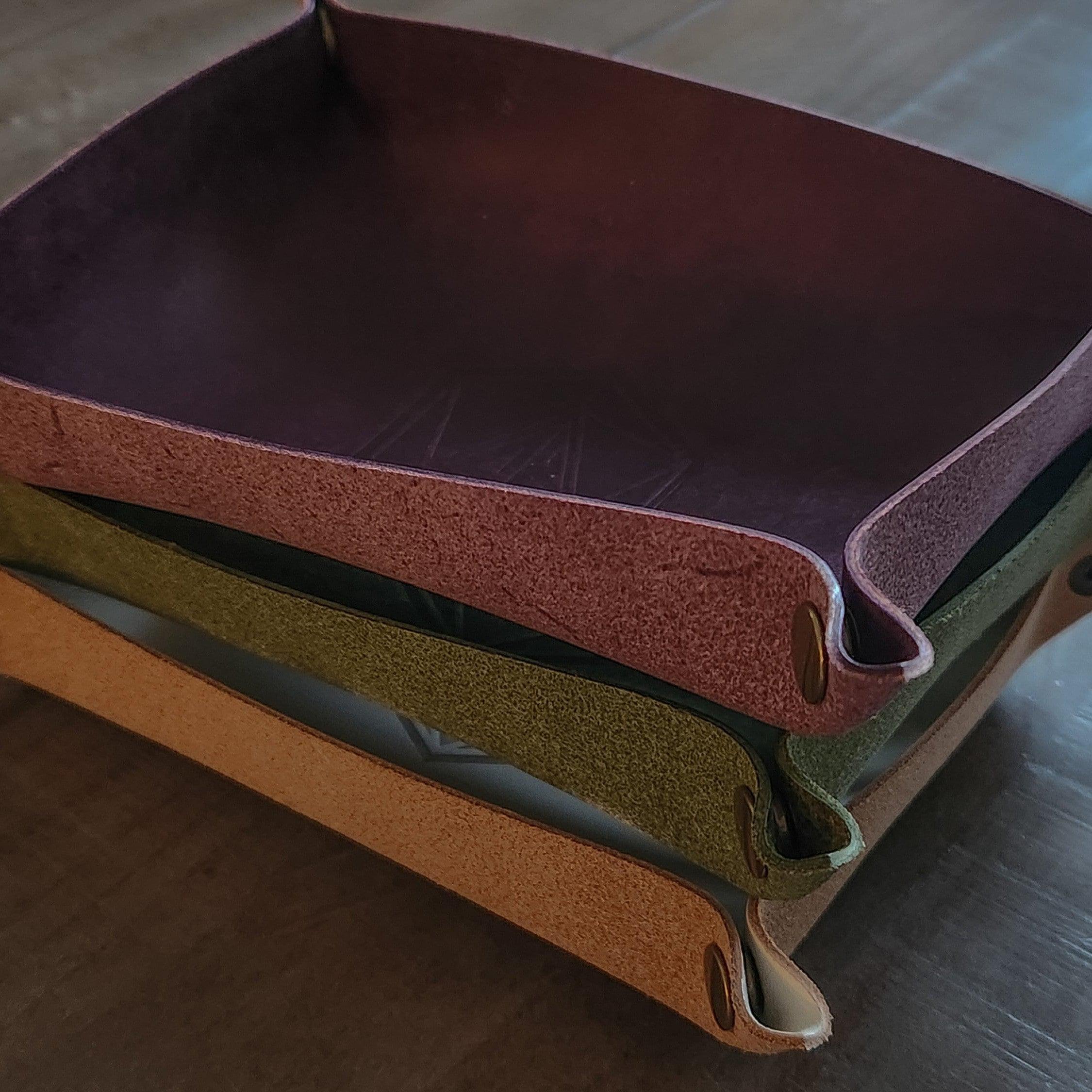 Purple and green and tan leather dice roll tray stacked