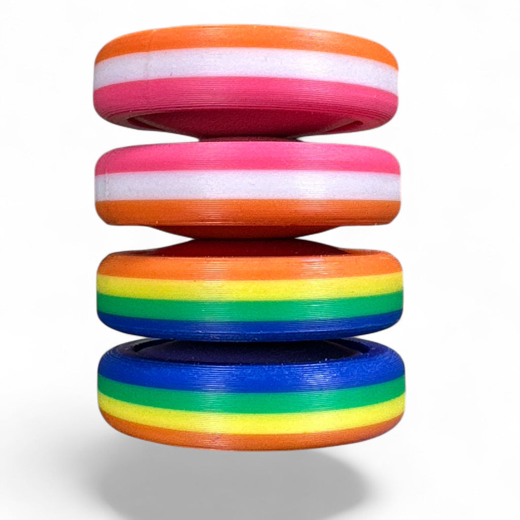 Stack of colorful discs on a white background