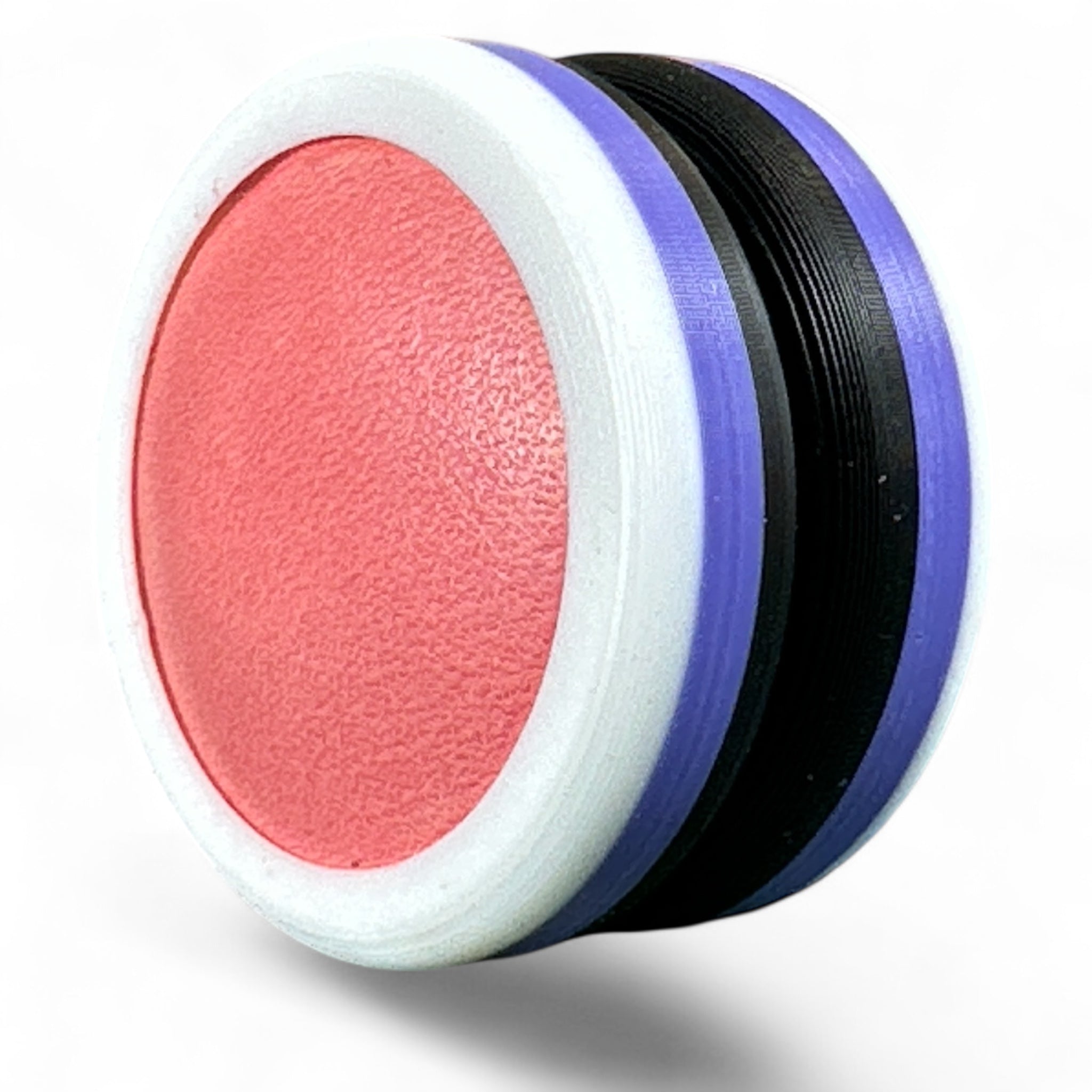 Pink, black, purple and white discs on a white background