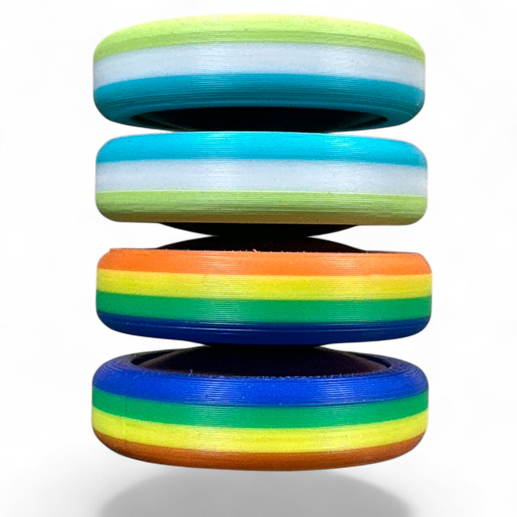 Stack of colorful rings with horizontal stripes on a white background