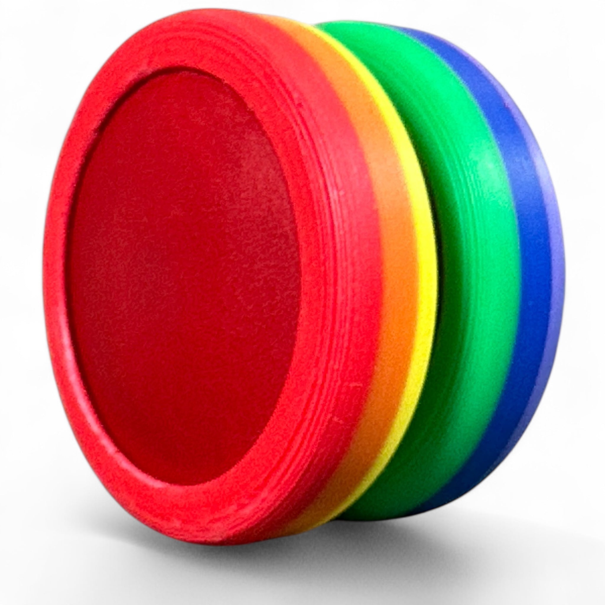 Four colorful rings in red, orange, green, and blue on a white background
