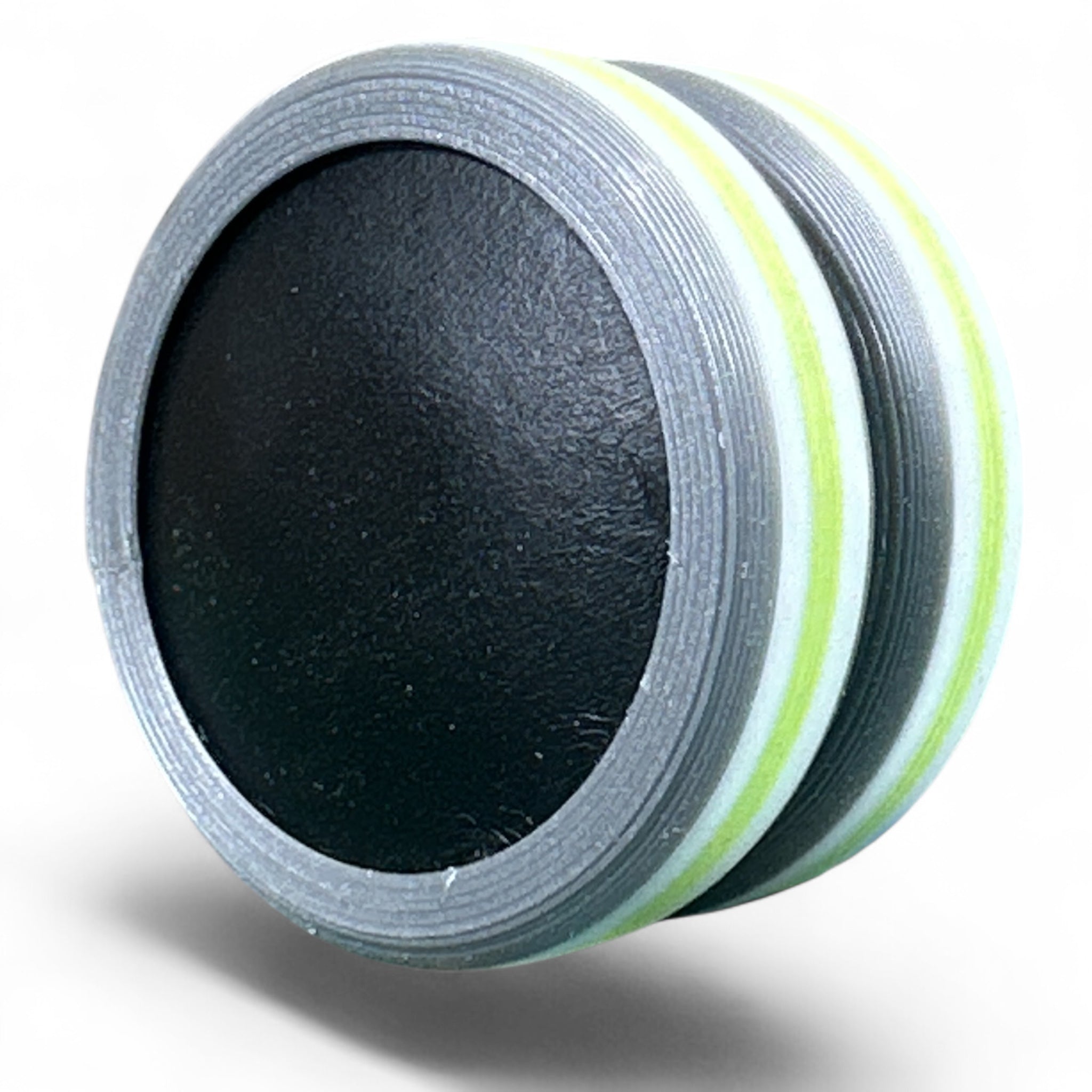 Black disc with a white border on a white background