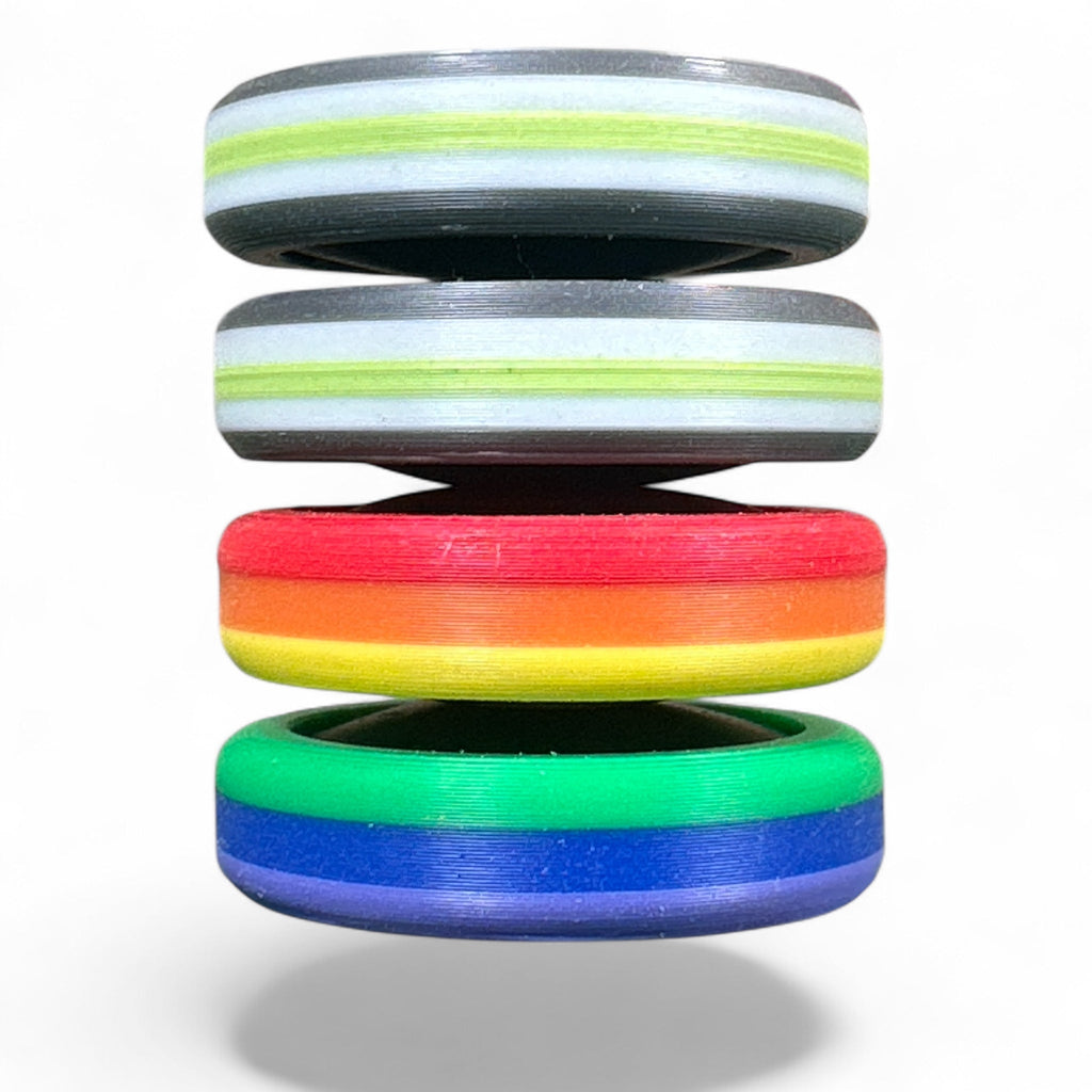 Stack of colorful rings with gradient colors on a white background