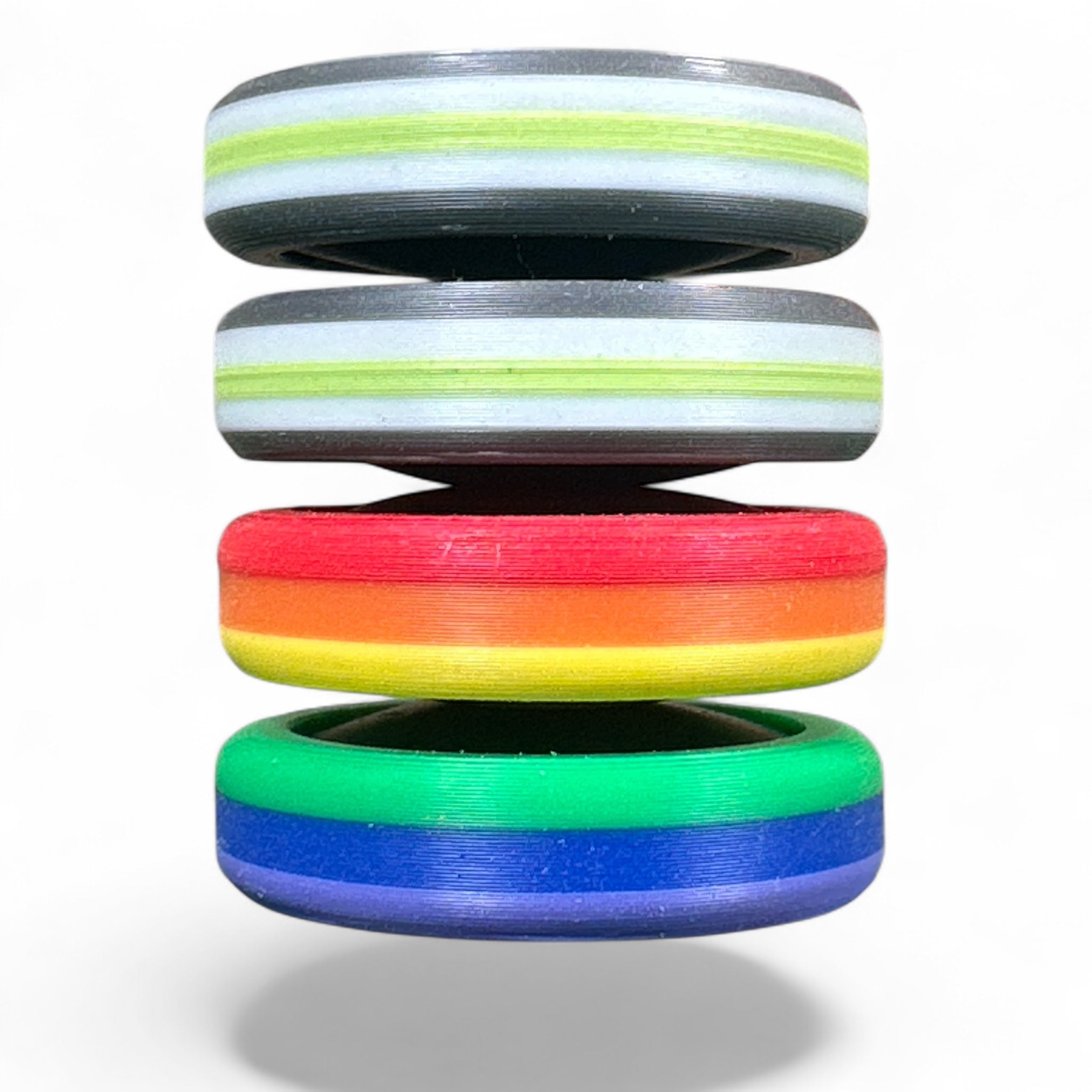 Stack of colorful rings with gradient colors on a white background