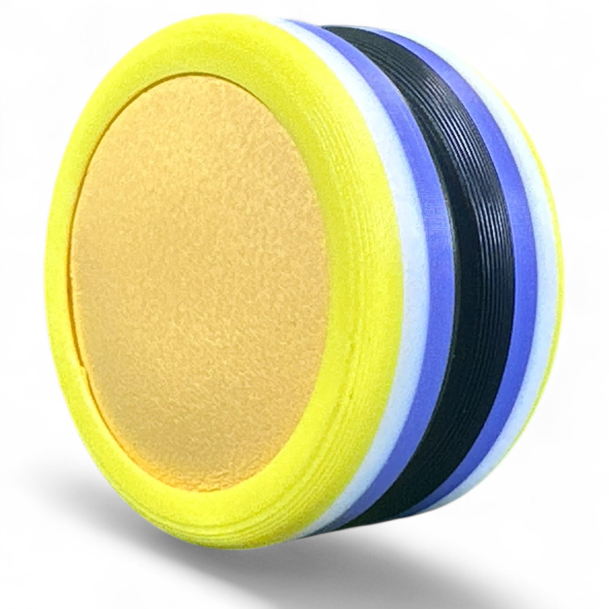 Roll of yellow disc with blue, white, and black strips on a white background
