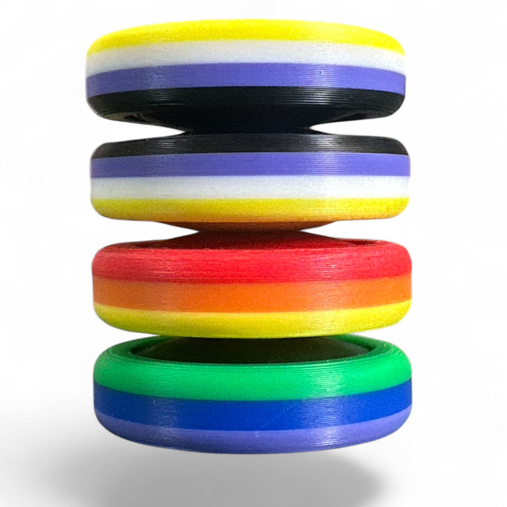 Stack of colorful rings with a white background