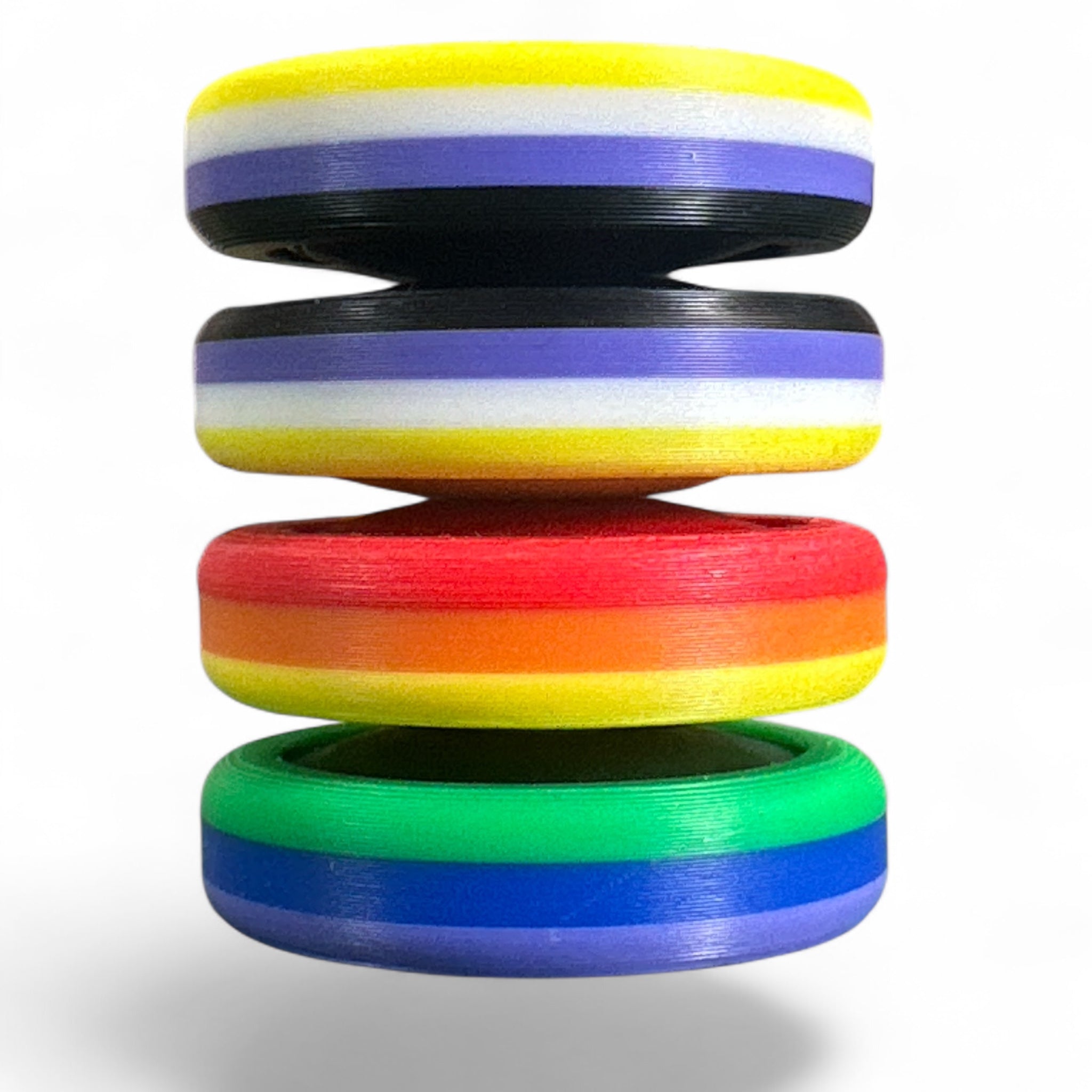 Stack of colorful rings with a white background