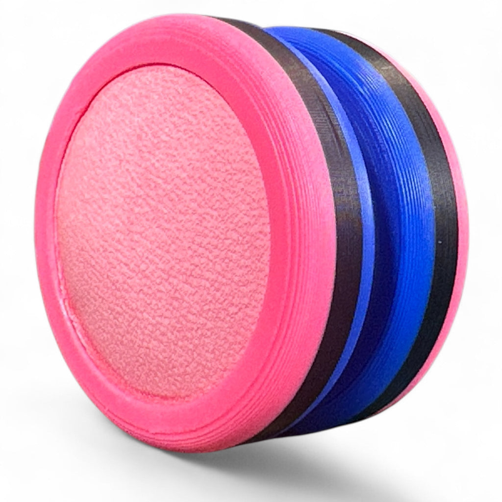 Pink and blue discs stacked on a white background