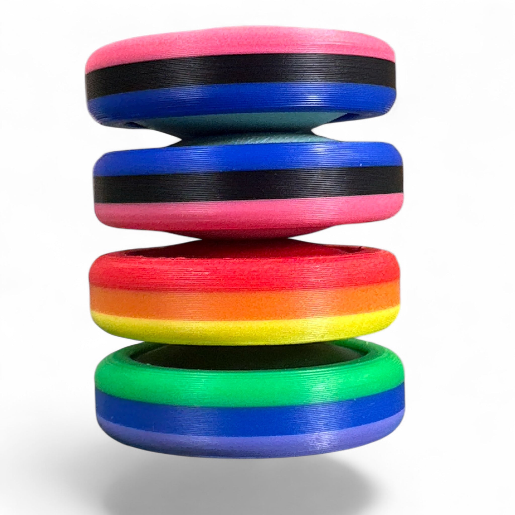 Stack of colorful discs on a white background