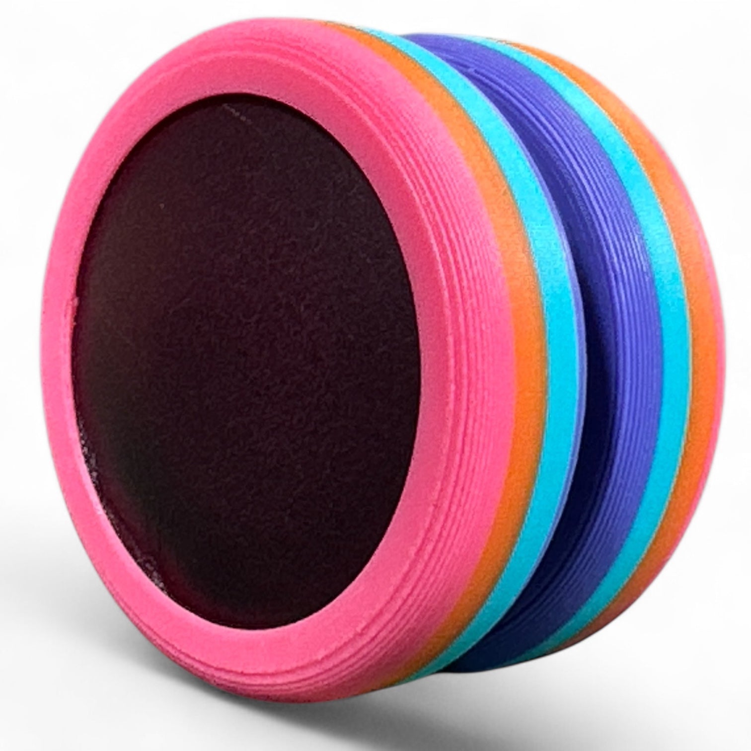 Colorful wheel with pink, blue, and orange discs on a white background