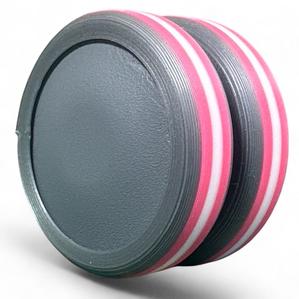 Gray and pink discs on a white background
