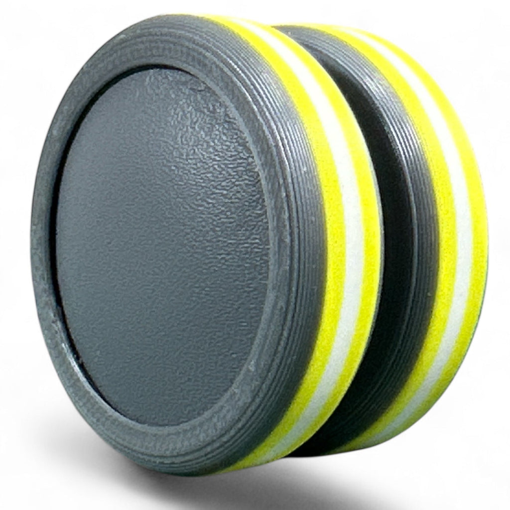 Gray and yellow discs on a white background