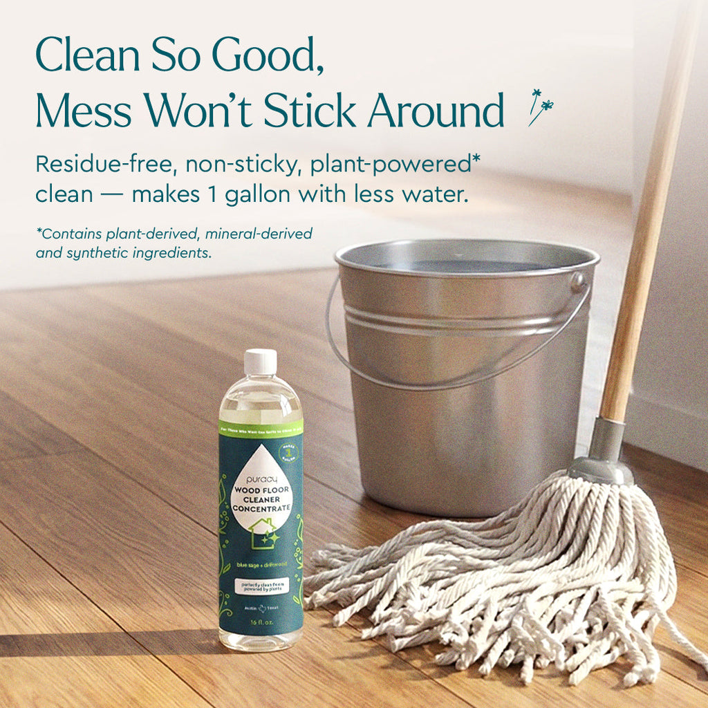 a concentrate bottle with bucket and mop
