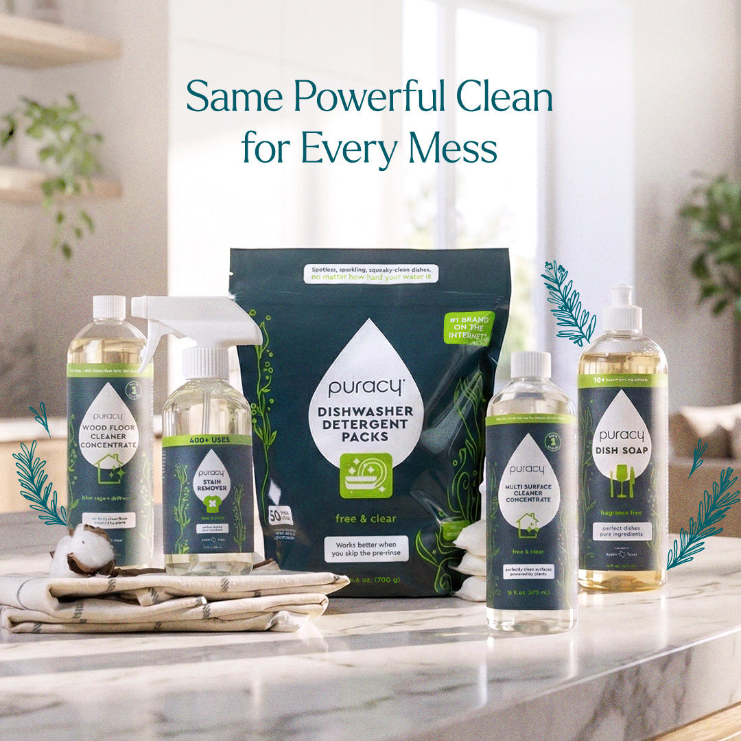 Puracy cleaning products including dish soap, cleaner, and detergent on a kitchen counter.