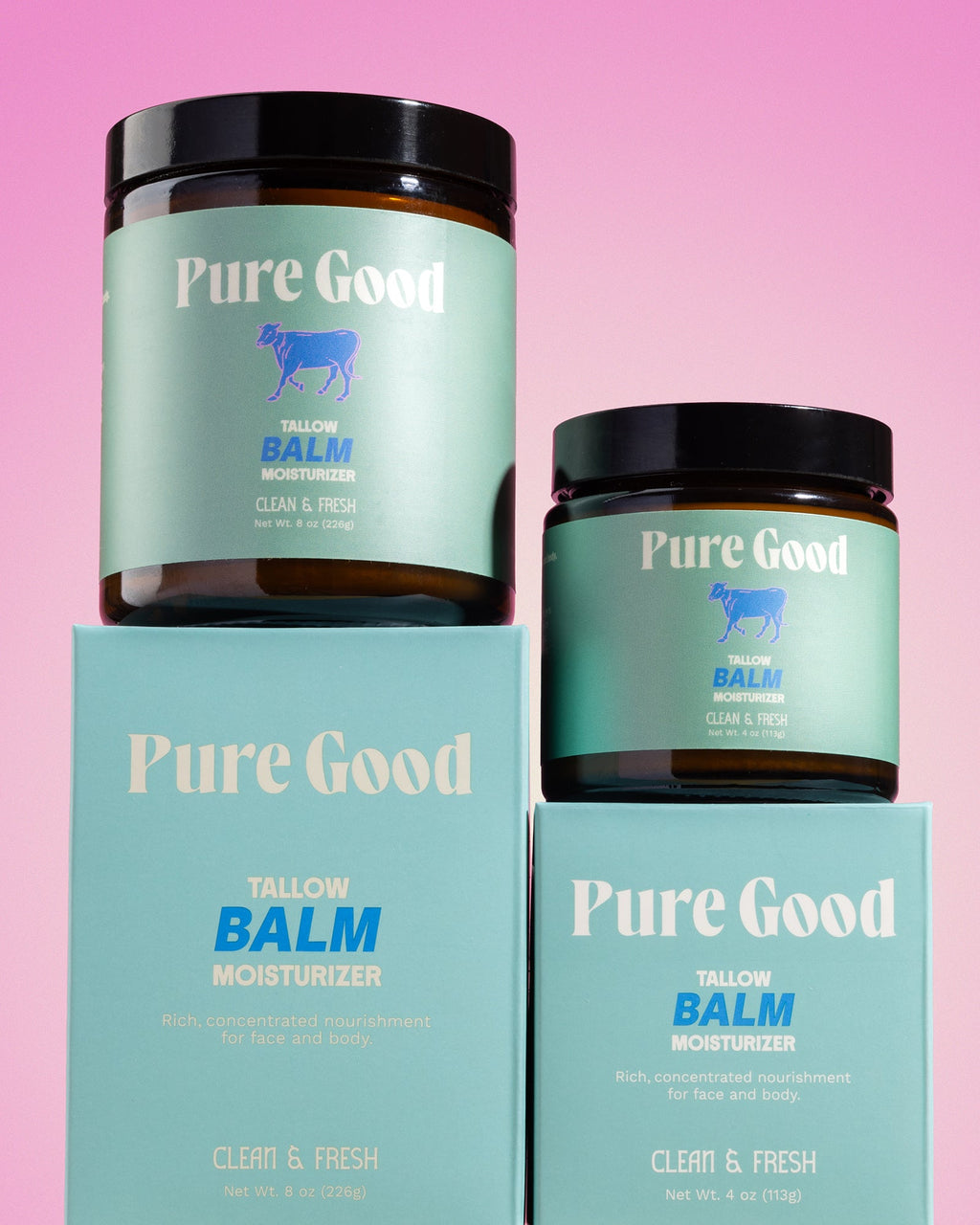 Two jars of 'Pure Good' balm on a pink background