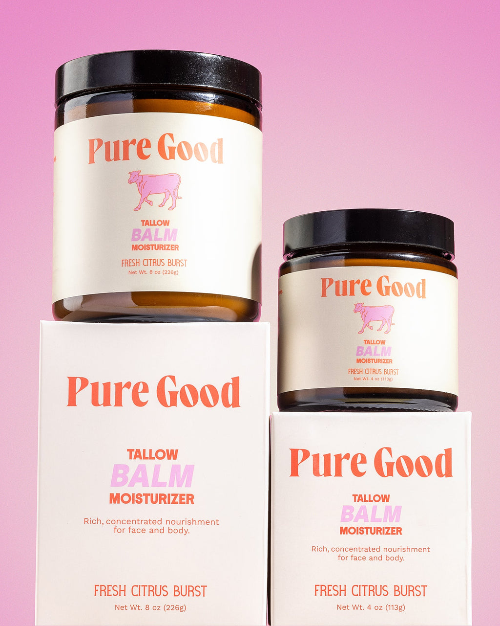 Two jars of Pure Good tallow balm on a pink background