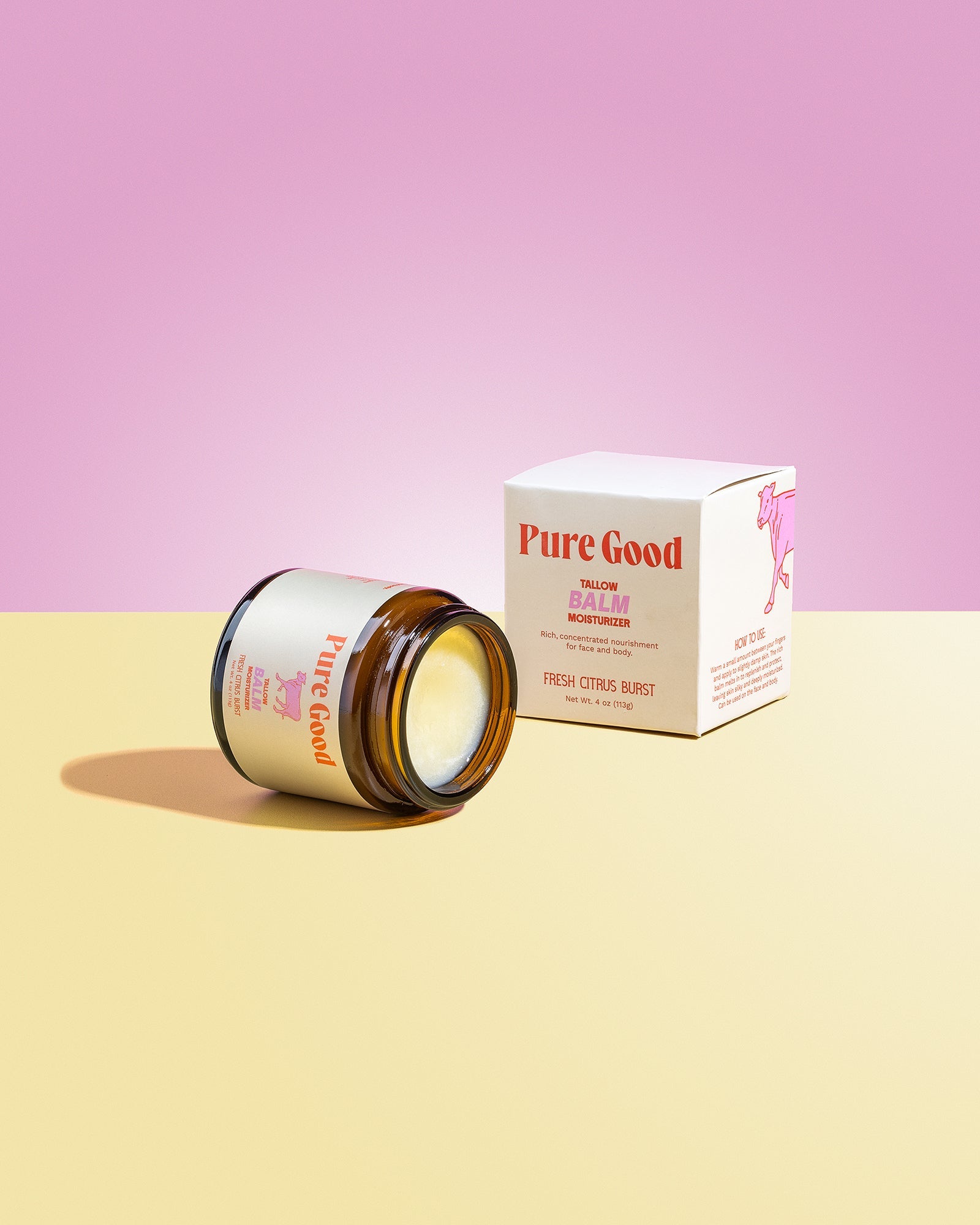Jar of Pure Good skincare product on a pink and yellow gradient background