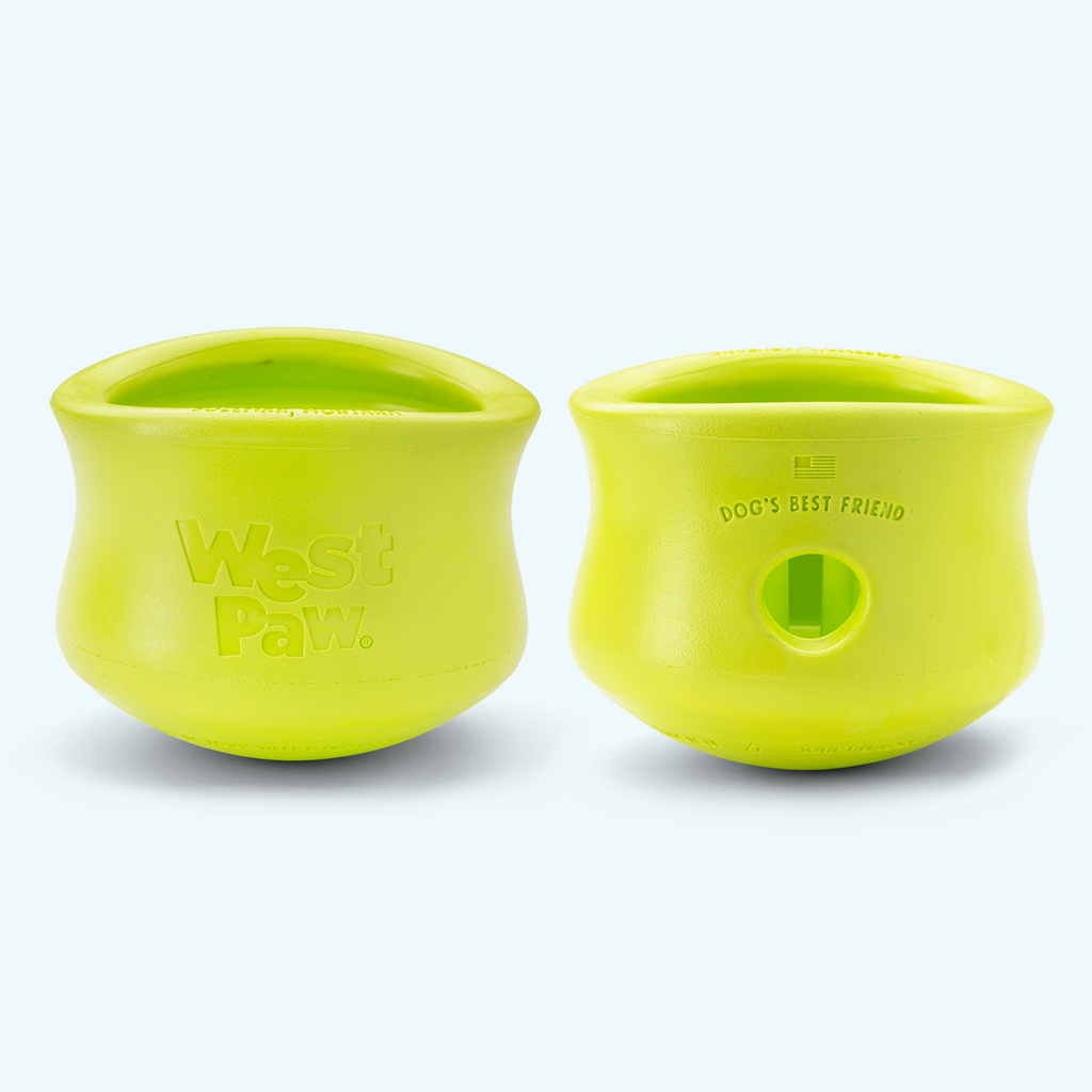 Two green pet toys with 'West Paw' branding on a white background