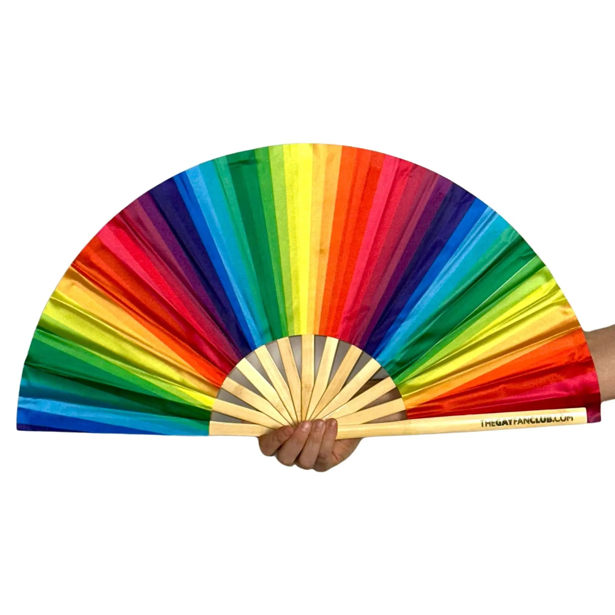 Colorful fan with a rainbow pattern held by a person on a white background