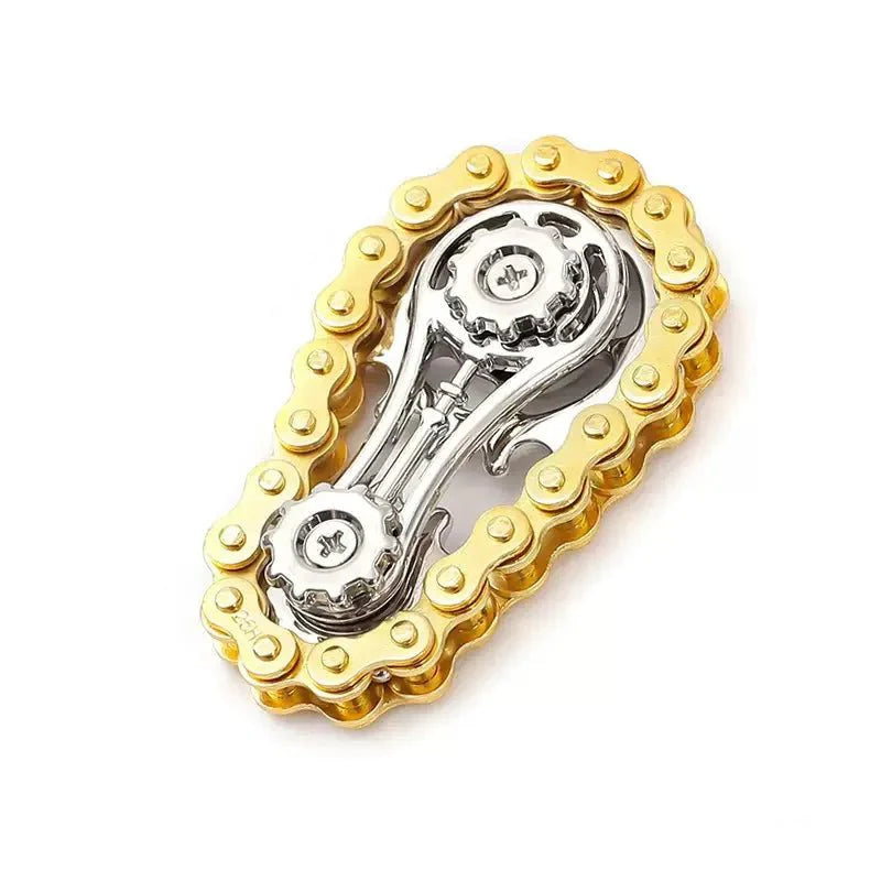 Gold and silver chain fidget spinner on a white background