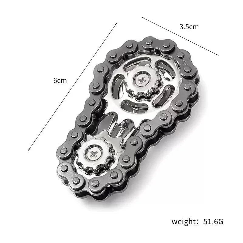 Metallic chain fidget spinner with measurements and weight on a white background