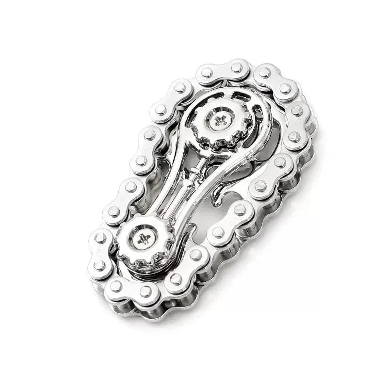 silver and silver chain fidget spinner on a white background