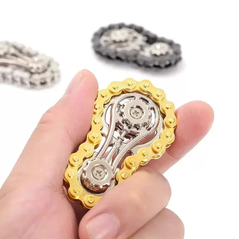 hand holding fidget toy made of gears and spinners