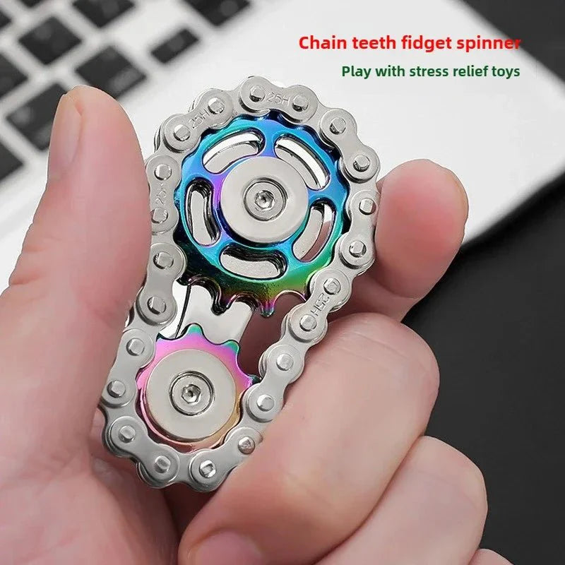 hand holding fidget toy made of gears and spinners