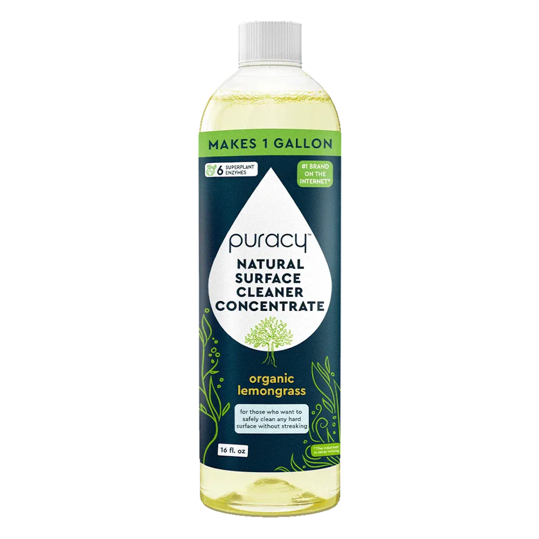 Bottle of Puracy natural surface cleaner concentrate with organic lemongrass scent on a white background