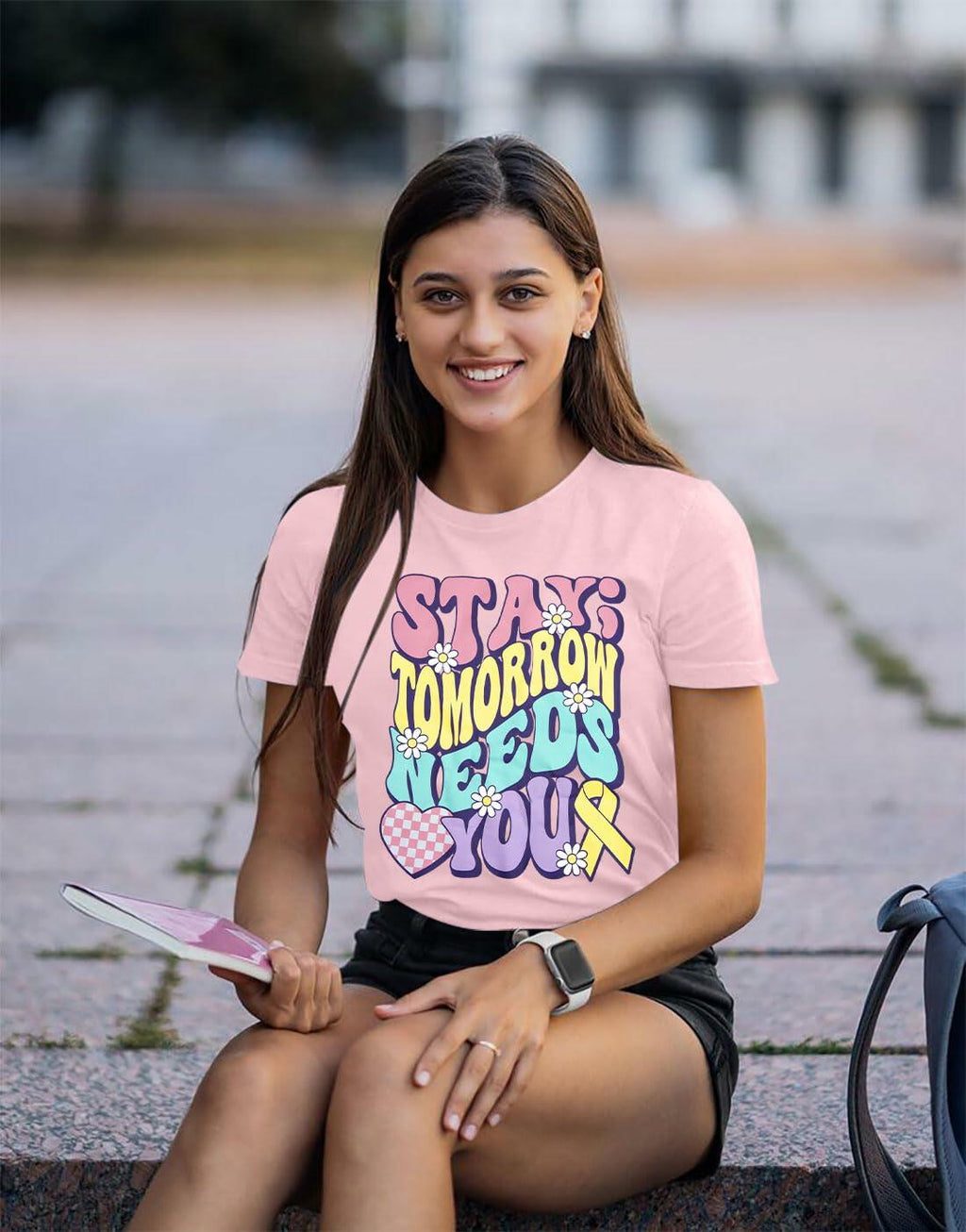 girl wearing light purple shirt saying Stay; tomorrow needs you