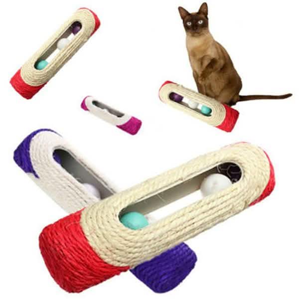 cat playing with tube cat toys with balls inside
