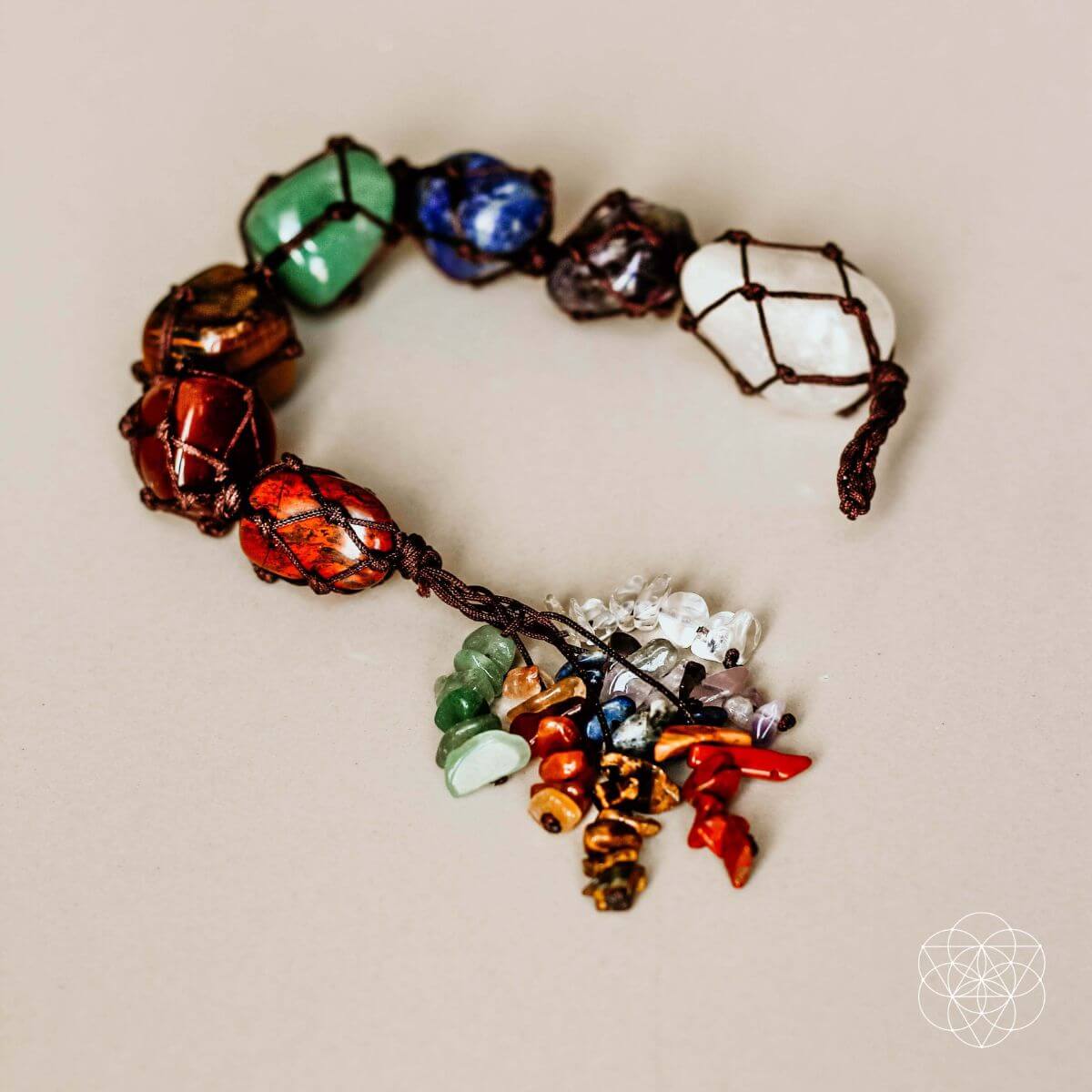 Multicolored beaded tassel on a beige background